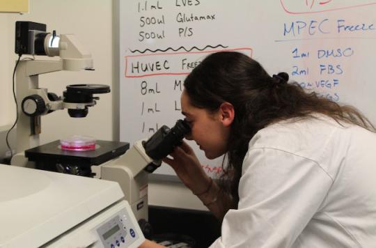 Student with microscope