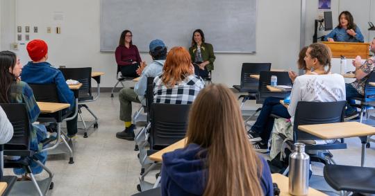 Kara L. de Lambert (left) and Jennifer Shada speak to SSU student artists on Nov. 6.