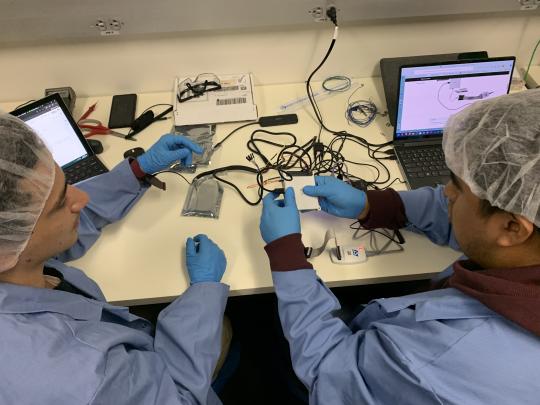 Students building CubeSat