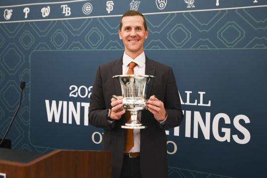 Matt Chisholm with MLB award