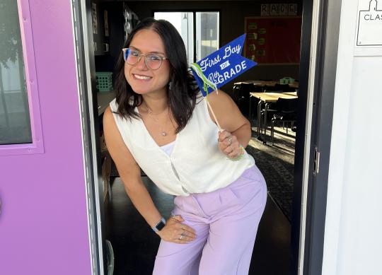 Alyson Azevedo, SSU '22, welcomes her students to the classroom on the first day of fourth grade.