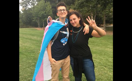 Carly Solberg poses with student 