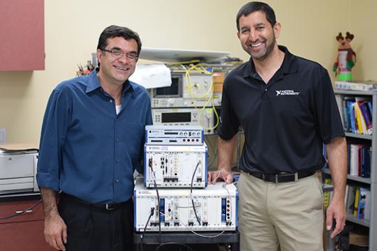 SSU engineering science professor Farid Farahmand and National Instruments VP of R&D Jin Bains with recently donated equipment.