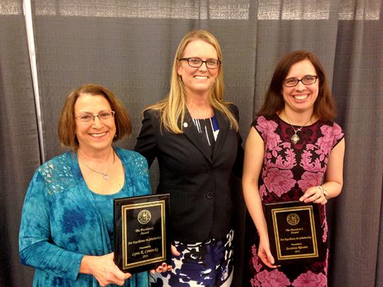  School of Science and Technology dean Lynn Stauffer congratulates Lynn Cominsky and Suzanne Rivoire on receiving the Sonoma State Excellence in Scholarship Award.