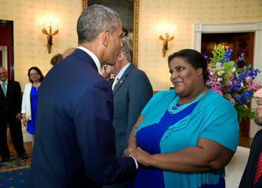 Faith Cheltenham shaking hands with President Obama