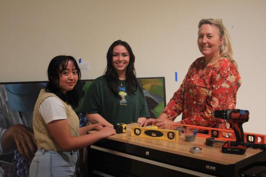 From left: Sonoma State art students Raiven Reyna and Mayla Romano with Gallery Exhibitions Manager Carla Stone. 