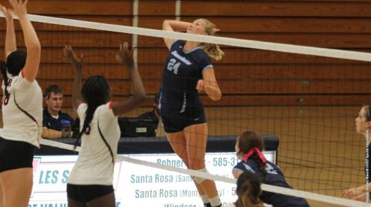 lexi reddick hitting a volleyball