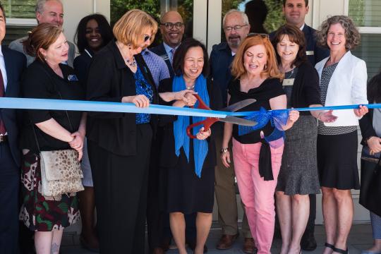 President Sakaki cuts the ribbon at Marina Crossing