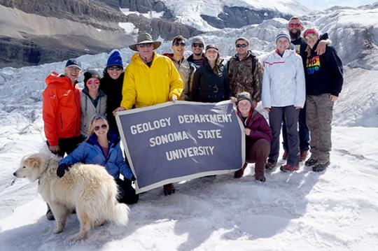 geology professor and students on glacier