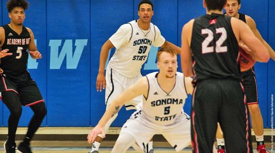 Seawolves playing defense in basketball game