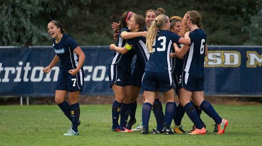 womens soccer celebrating at the ncaa tournament
