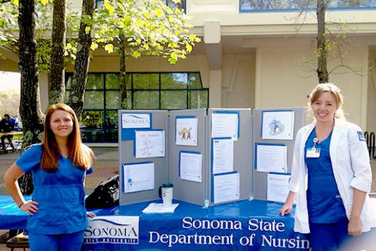 two nursing students tabling 