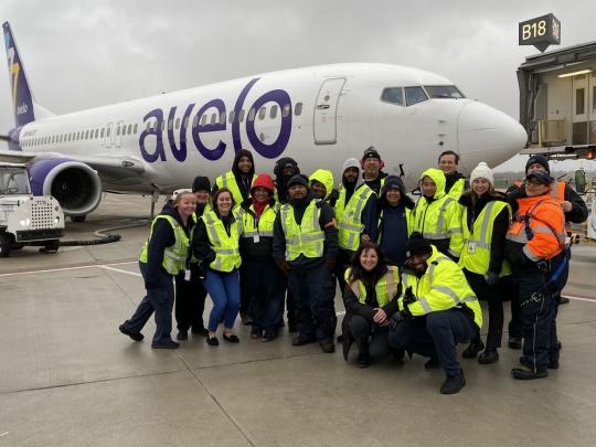 Molly Oates (left) with her Avelo colleagues.