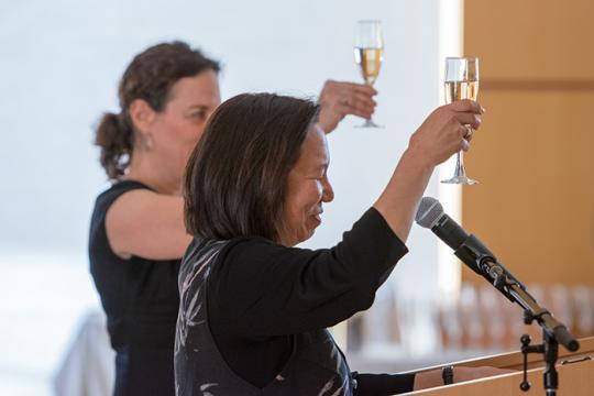 Sonoma State University President Judy K. Sakaki and OLLI Director Carin Jacobs toast the OLLI program at a champagne reception Friday afternoon after President Sakaki announced it has received a $2 million bequest. 