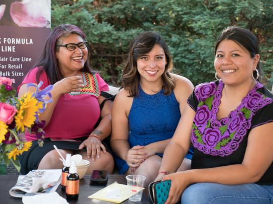 three women smiling