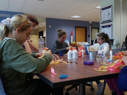 Campers focusing on their projects in the Sonoma State Makerspace // Photo by Francisco Carbajal