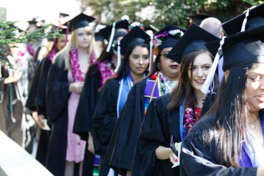 Students walking in commencement at Sonoma State 