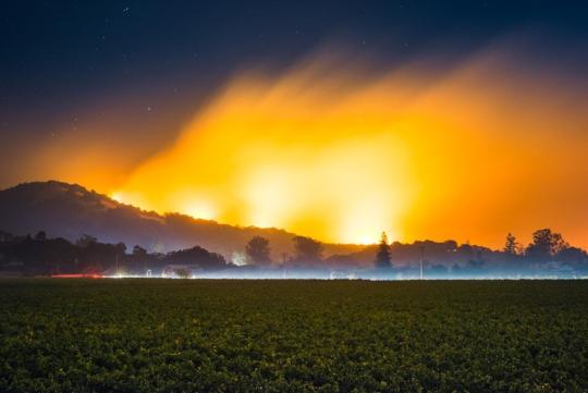 Christopher Woodcock, "Nuns Fire burning east of the City of Sonoma, 4 am October 15th 2017," 2018, photo