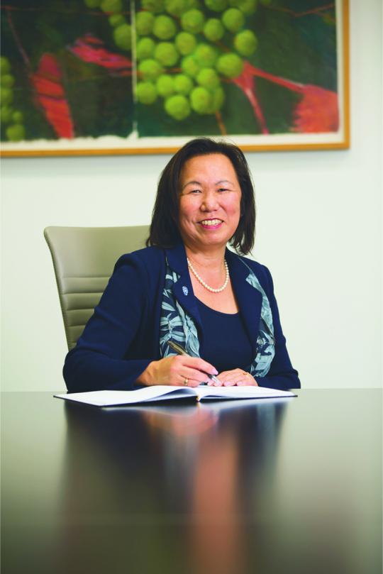 judy sakaki at her desk