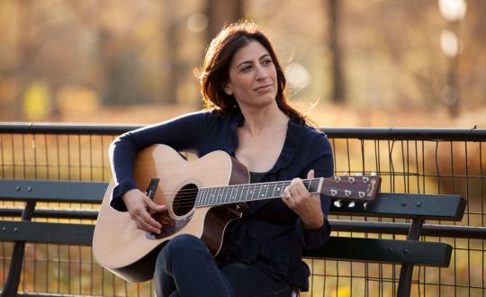 sharon goldman with a guitar 