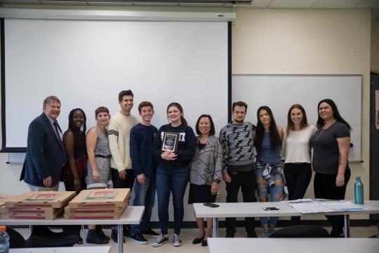 President Judy K. Sakaki with The Sonoma State STAR editors and their new award. // Photo by The Sonoma State STAR