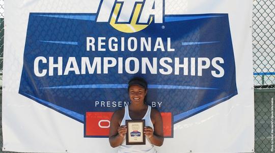 tennis player holding plaque