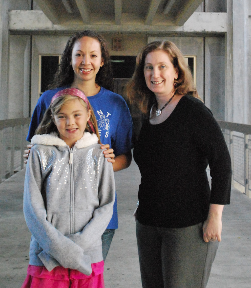  Professor Sheila Katz and SSU student Kristel England, a welfare mother who attends SSU, and her daughter. 