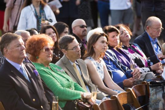 From left, Gerret Copeland and Tatiana Copeland, proprietor and president of Bouchaine Vineyards in Napa, and other audience members look on during the opening ceremonies at the Wine Spectator Learning Center at Sonoma State University on May 29.