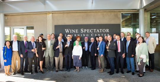 From left, SSU President Judy K. Sakaki, Rep. Mike Thompson, D-St. Helena, WBI Executive Director Ray Johnson and other members of the Wine Business Institute board and key donors pose for a photo outside the new Wine Spectator Learning Center on May 29